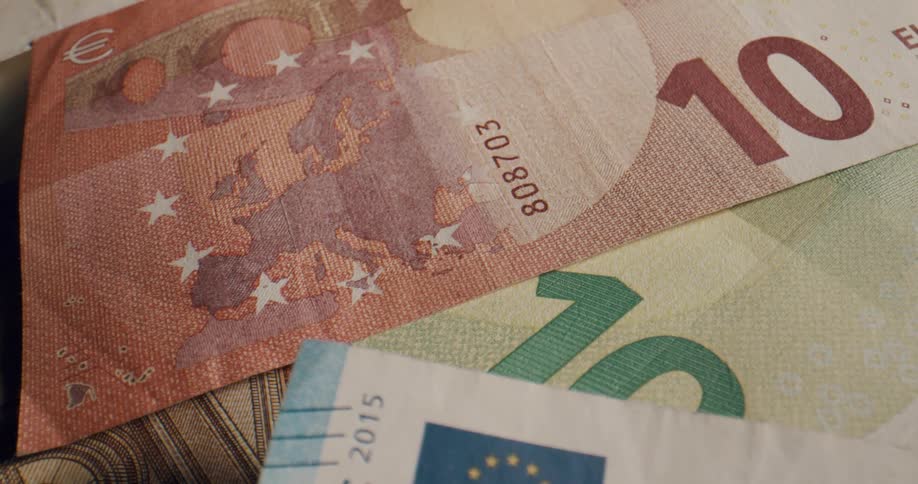 A pile of colorful european banknotes