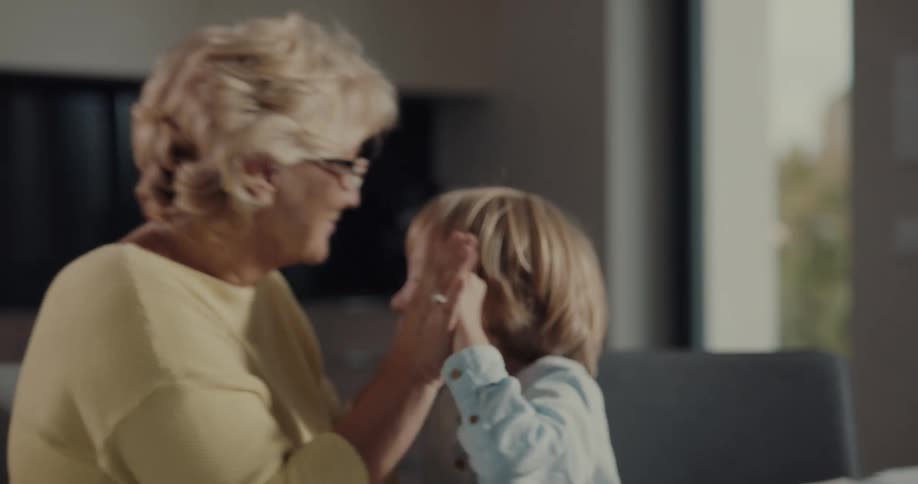 Grandmother and grandson are hanging out