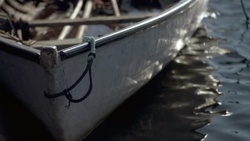 A boat sitting in water