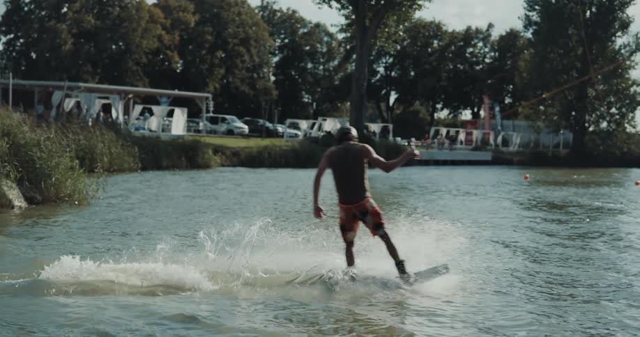 Young man is water skiing in the water
