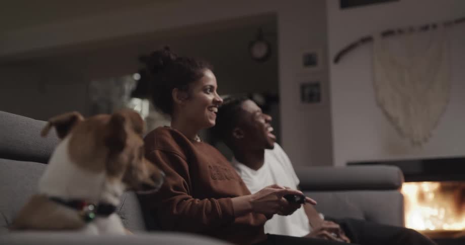 Young couple is playing video games