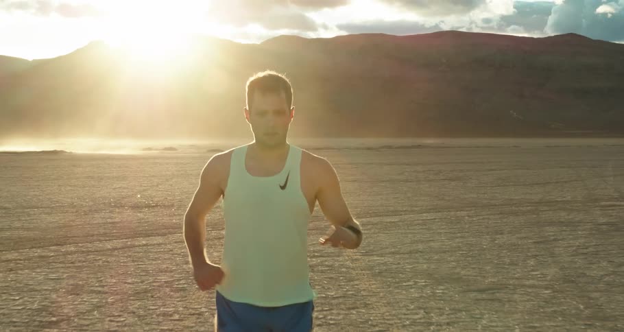 Young man jogging in the desert
