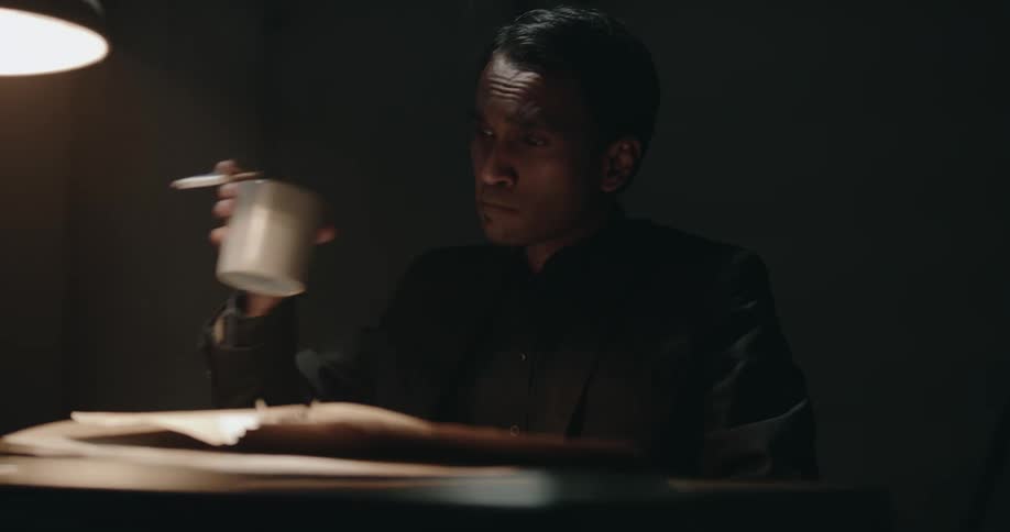 A police officer interrogating someone