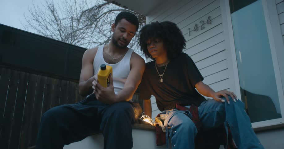 Young woman and man are sitting down