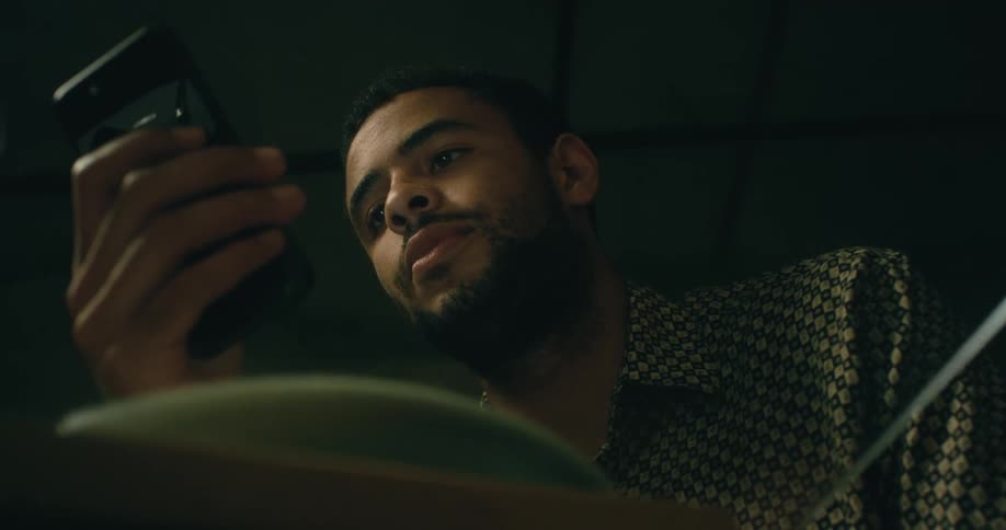 Young man is on his phone