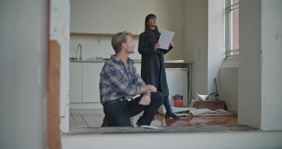 Man and woman are talking indoors