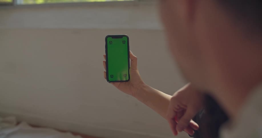 A view of a person holding a phone