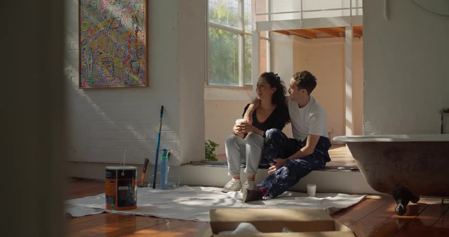 Young couple are sitting down and talking
