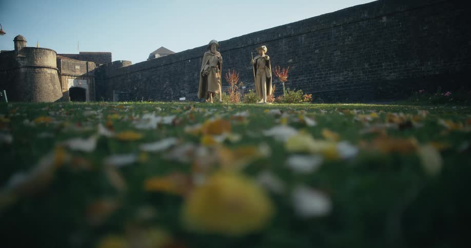 A view of statues at a castle