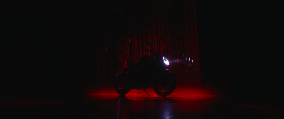A motorcycle sits on a stage