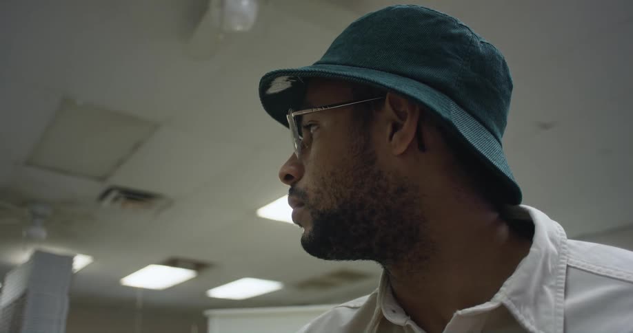 A man looks around his empty office
