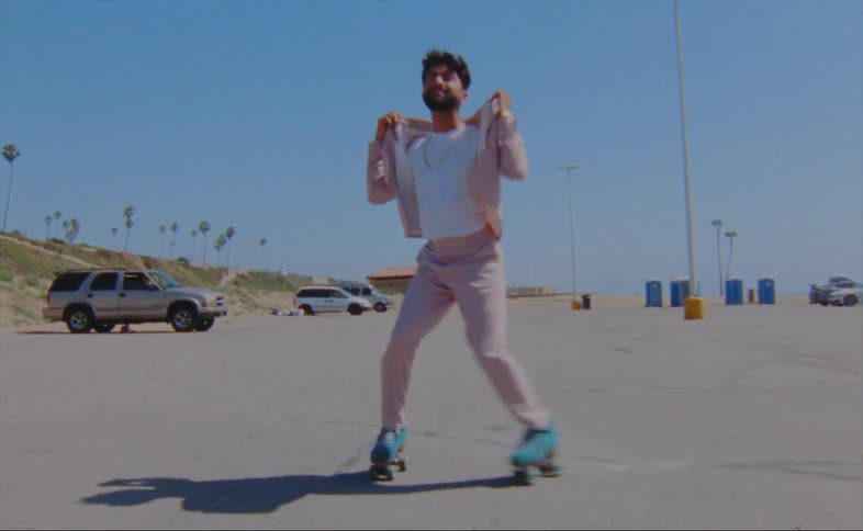 A man is dancing on roller skates