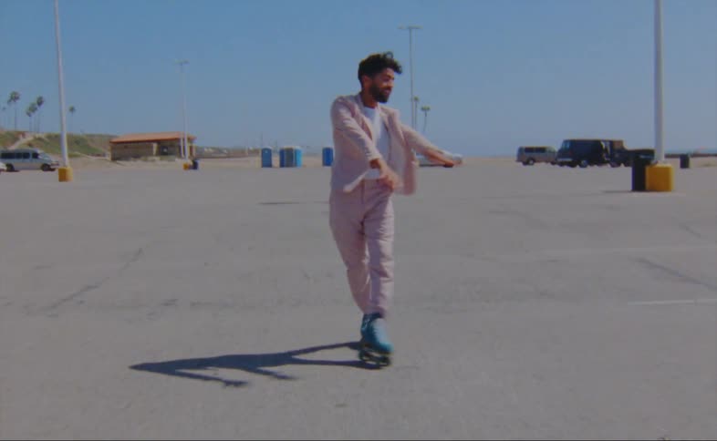 A man is dancing in roller skates