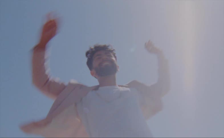 A man spins in a circle