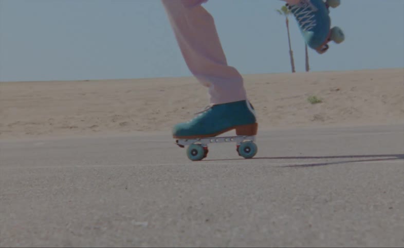A person on roller skates dances
