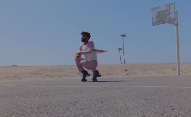 A man dancing outdoors
