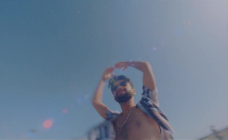 A man is dancing and spinning