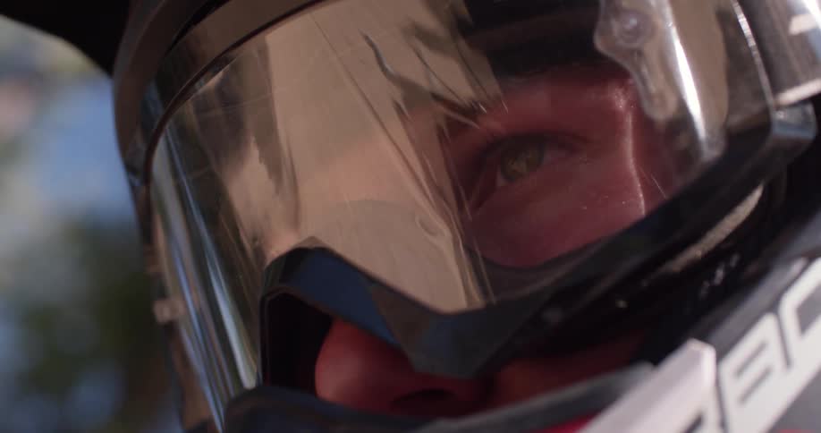 Close up of a person wearing snow goggles outside
