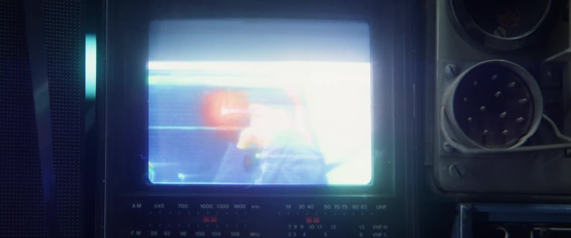 An old television screen is flickering as static moves across the screen