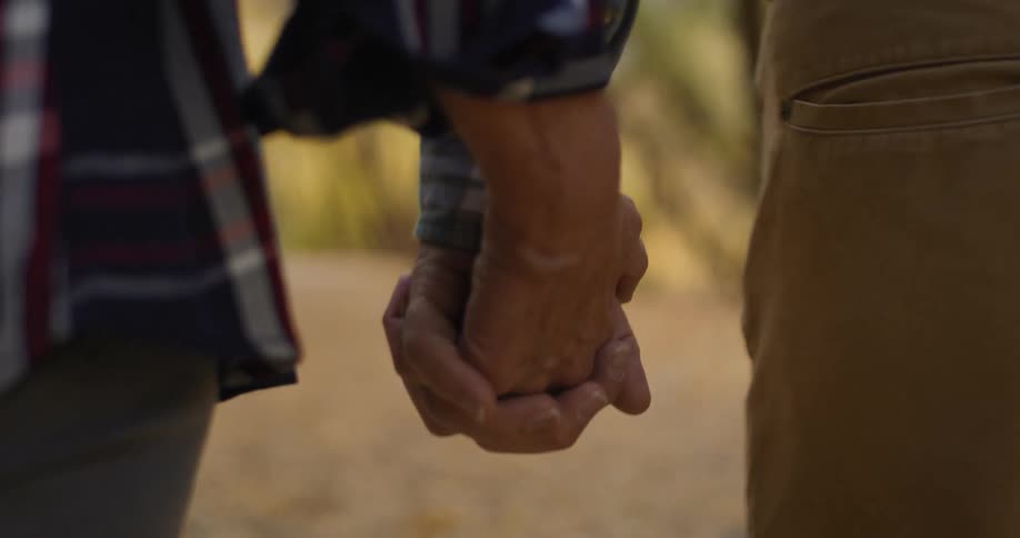 A man and woman hiking outdoors