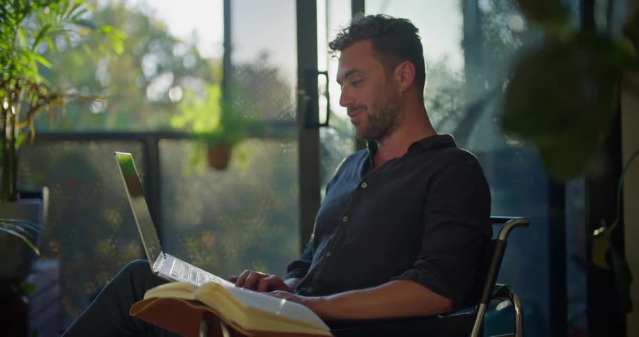 A man talks on his laptop