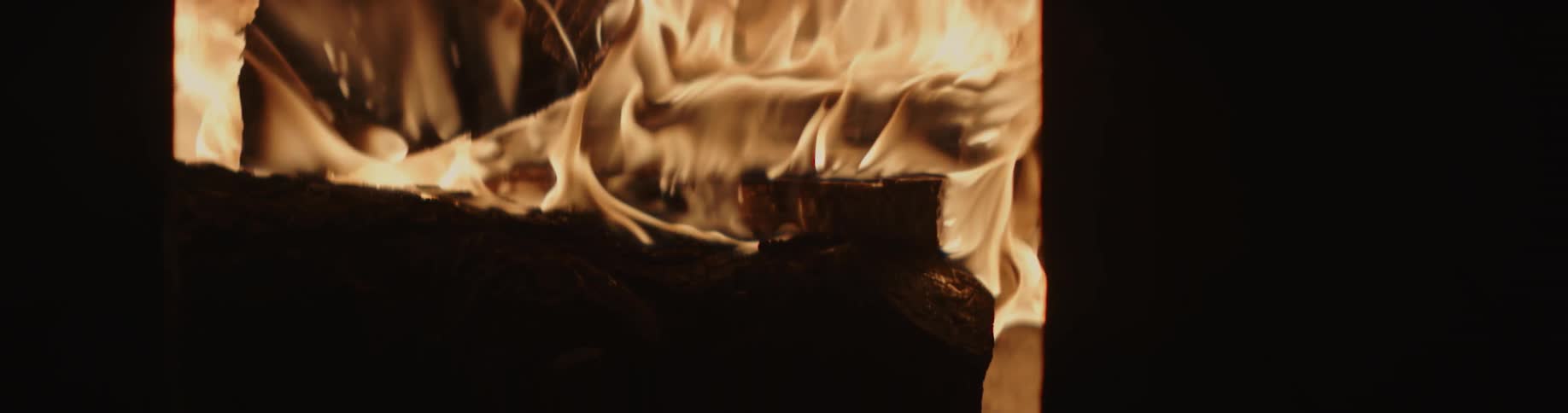 Flames rolling and burning in a fireplace