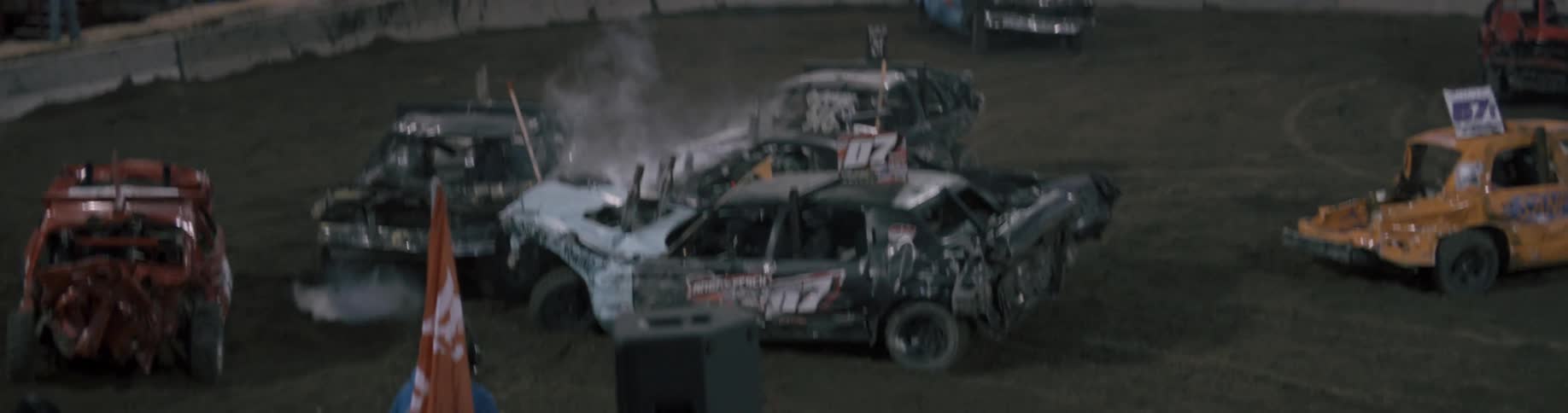 A car engine explodes after being rammed during a demolition derby pileup