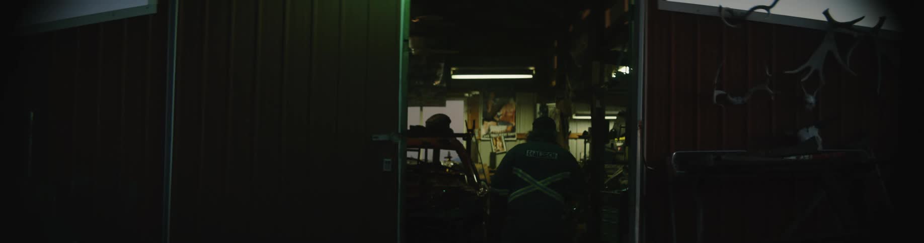 A mechanic enters the shop