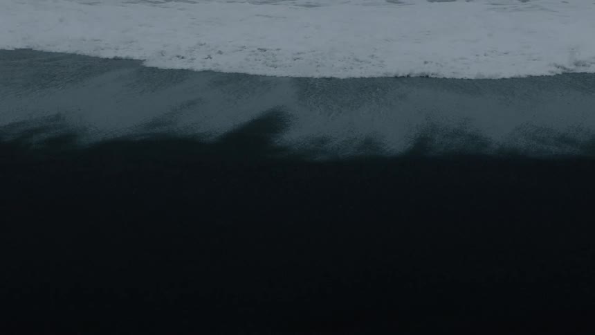 The water moves over the shore