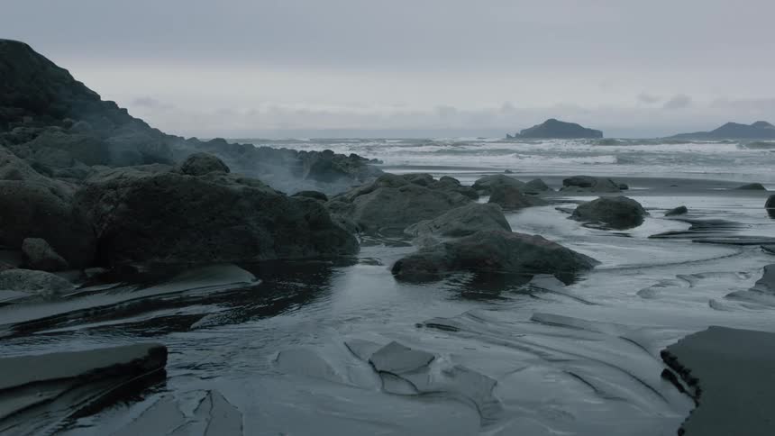 Steam rises form the ice on the shore