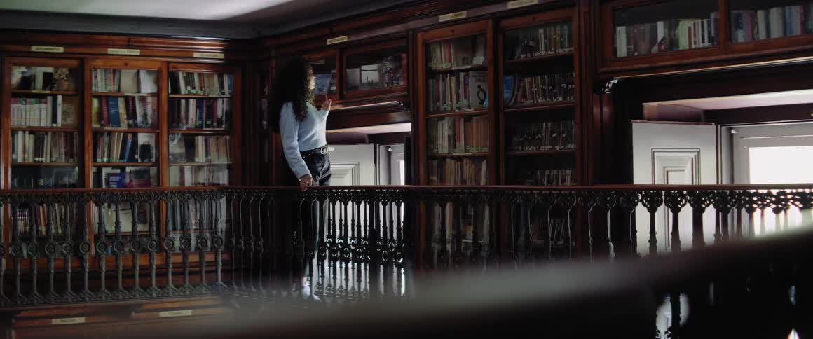 A woman is browsing the library