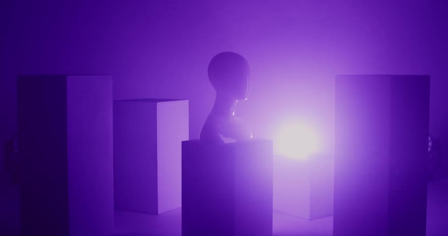 Bright lights flash in a room with a model of head sitting on blocks