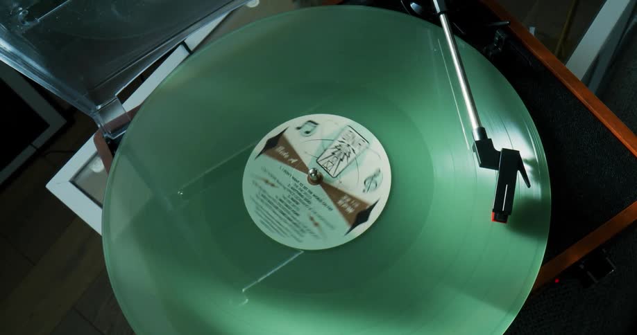 An album spins on a record player