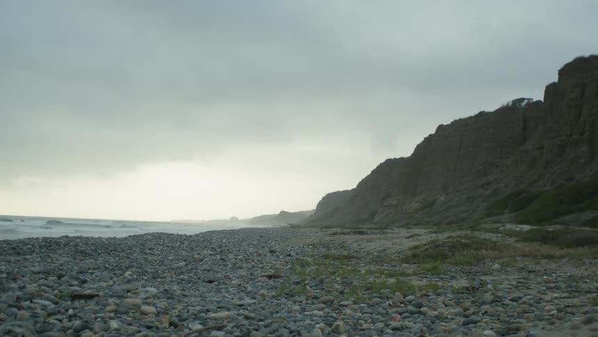 A view of a beach with rocks