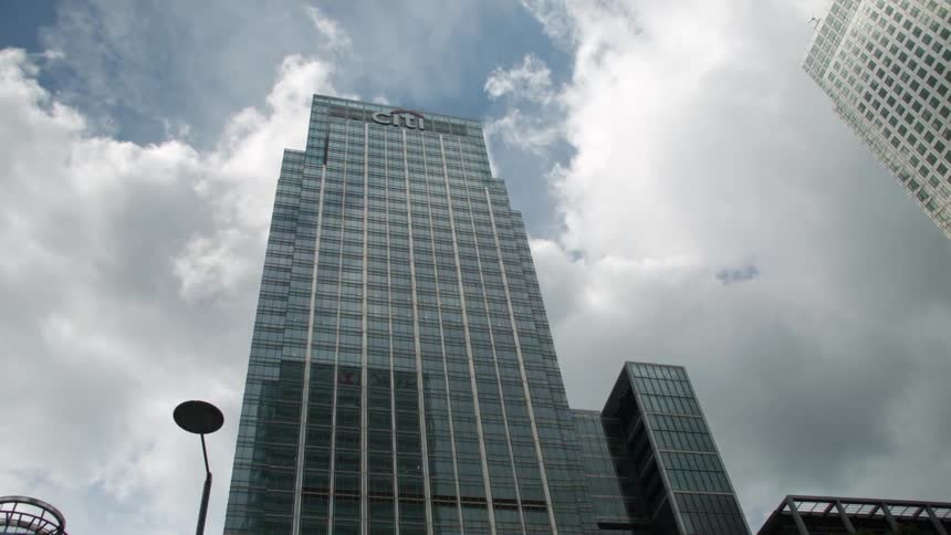 Clouds and sky are reflected on the windows of a skyscraper