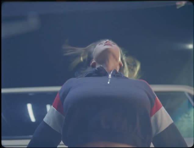 A woman is pushed back