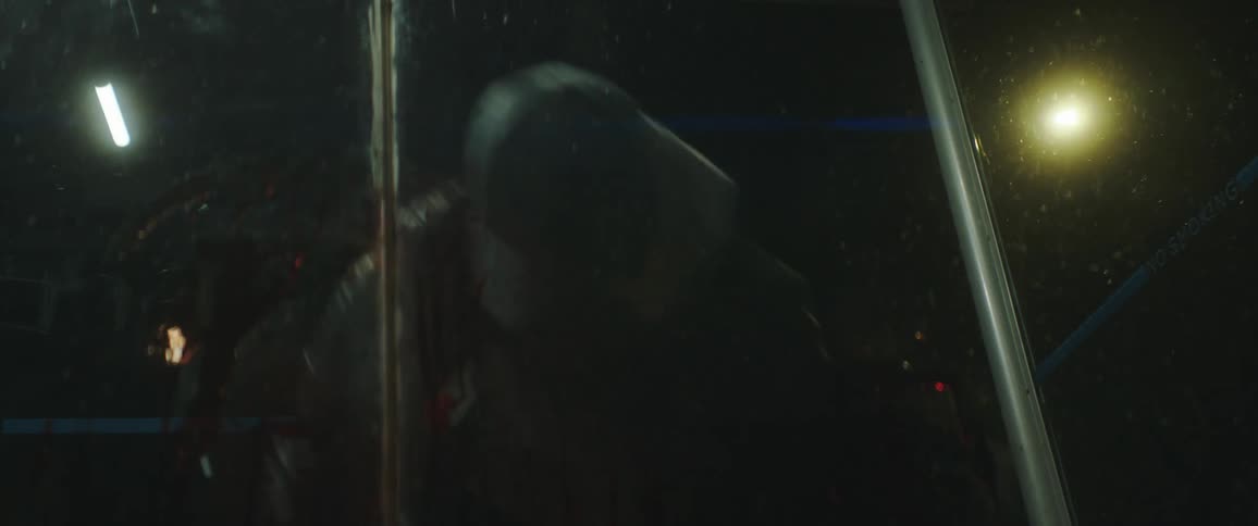 A mans hands are covered with blood as he punches someone