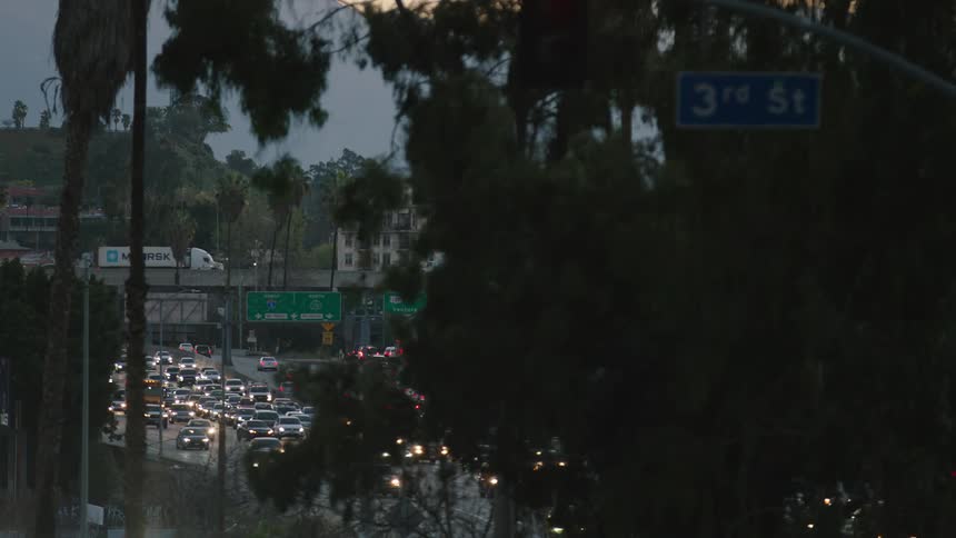 Rush hour traffic clogs up a freeway in a city