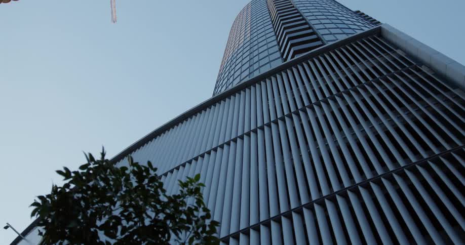 Close up of the outside of an office building with apartments around it