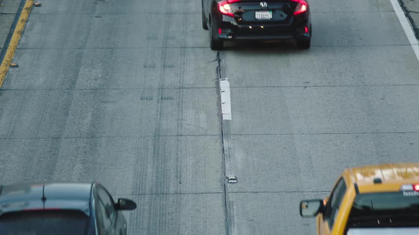 Vehicles travel on the road