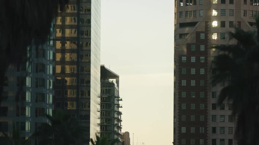 Exterior view of apartment buildings at dusk