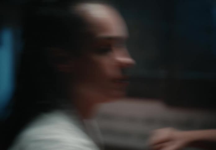 A female athlete is sparring in the gym