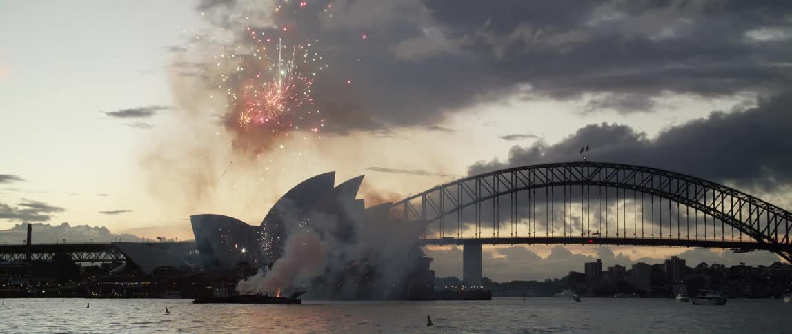 Fireworks explode over the bridge