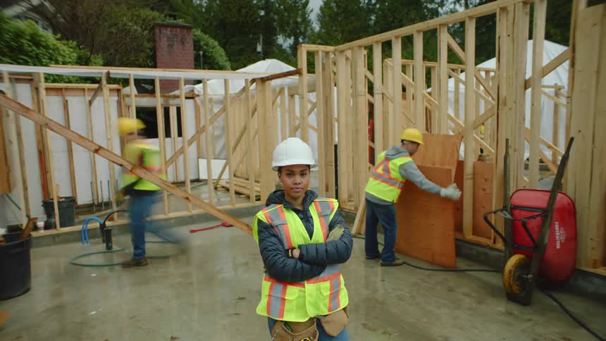 Time lapse view of construction employees working outdoors