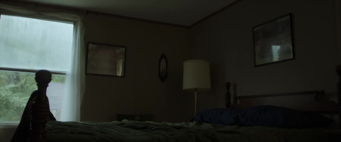 Empty mobile home bedroom day
