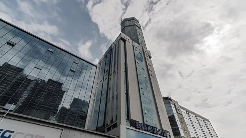 The tall tower has reflective windows