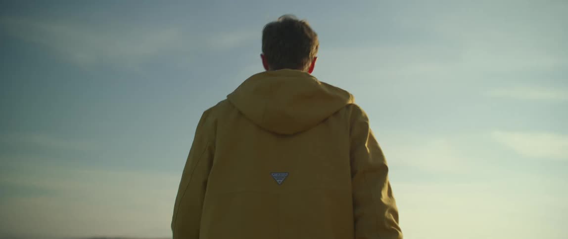 A man is walking outside