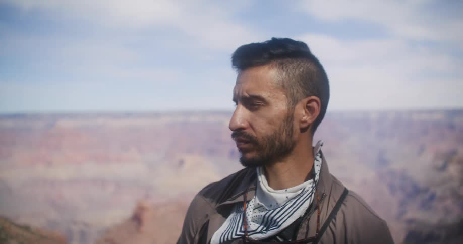 A portrait of a man at the grand canyon