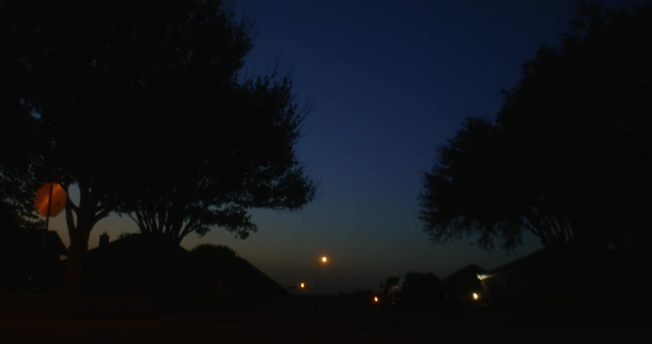 A man runs in the dark at sunset