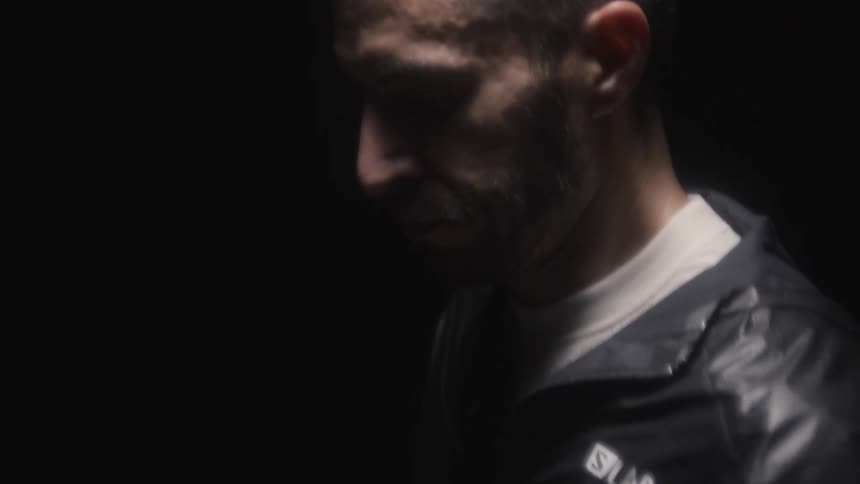 A man is running in the dark